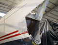 The edges in the damaged area are then cut away down to the healthy laminate