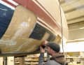 He has cut out defective laminate and is now rebuilding it