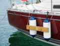 A fender board is a wooden plank that is placed on top of two fenders