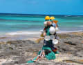 The almost pink-coloured beach stretches along the east side of Eleuthera