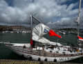 The unmasted yacht was able to reach the harbour under its own power