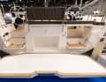 The bathing platform is simply huge, and there are two companionways from the cockpit. The central compartment is for the life raft