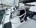 The helm station is mounted higher up on the side. All halyards, sheets and trim lines are routed rearwards into the helm cockpit.