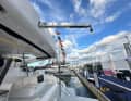 A characteristic feature of Aquila’s catamarans is the extendable jib for launching and retrieving the dinghy. This is operated at the touch of a button.