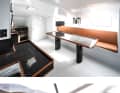 The saloon of the catamaran ‘Mer Agiteé’ has space for luggage, bicycles and passengers.
