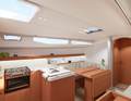 Below deck, the new model adopts the style and layout of its big sister, the J/45, but the saloon looks much more compact