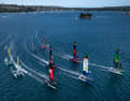 The SailGP fleet races across the Sydney course.