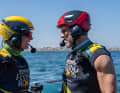 Hugh Jackman, aka ‘Wolverine’, took to the water in a yellow helmet on the Bonds Flying Roos’ F50 foiler to face off against Ryan Reynolds, aka ‘Deadpool’, in a red helmet on the boat belonging to Canada’s Team NorthStar.