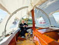 A cockpit tent supported by round arches turns the cockpit into a cosy saloon