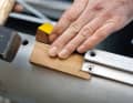 If the fitting in question is still stuck, hardwood wedges and a hammer will help to loosen it
