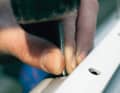 Now pull the rest of the pin out of the pliers, insert it into the rivet from above and use it to drive through the loose rest of the pin. Otherwise it would corrode later