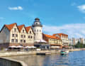 The buildings modelled on half-timbered houses, including the lighthouse, are located in the centre of Kaliningrad on the banks of the Pregel River