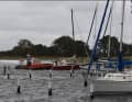 Yachts torn loose are secured
