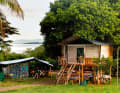 Under tropical and spartan conditions, but in harmony with nature and the locals...