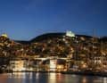 The illuminated main town of the island of Syros, Ermoupoli - pure romance despite the busy ferry traffic.