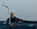 The capsized test boat of the Italians