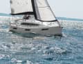 A lot of work is needed on the mainsheet and rudder in the strong gusts