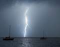 Lightning strikes near some yachts