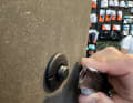 The pin becomes visible with metal objects (here a cutter)