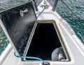 The forepeak is large enough to store the fenders. The water remains in the recess for the lid
