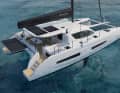 The boom is run close over the cabin top. Hoisting the mainsail into the lazybags is easy