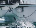 The life raft rests in a basket under the trampoline and can be deployed in a few simple steps and without any effort