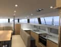 Deck saloon with raised seating area, plus an all-round glazed cabin superstructure. The view from the saloon is magnificent.