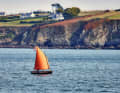 Over 100 years ago, fishermen and smugglers travelled here in boats like this one