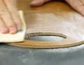 Intermediate sanding and UV protection: Allow the resin to harden, wash off and sand with 80 grit paper. Then remove the dust and apply three more coats using the wet-on-glue method. Then sand finely and seal with a 2K lacquer as UV protection