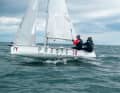With the crew sitting aft, the bow goes well over the small waves