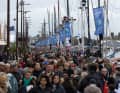 A crowd of millions celebrates its heroes before the start in Brittany.