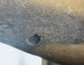 Larger blowholes are also recognisable. These are air pockets from the manufacturing process