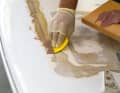 Air pockets are likely to be exposed during sanding. They are filled with a microballoon mixture together with any existing joints