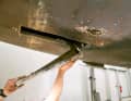 ... attached to one of the drill holes and the stern tube that was no longer needed was cut out of the hull as cleanly as possible
