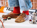 Zum Nationalsymbol haben es die roten Socken des verstorbenen Sir Peter Blake gebracht. Er trug sie bei allen Regattasiegen, seither gelten sie in Neuseeland als Zeichen des Erfolgs