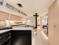 Open, bright extension below deck. The layout is rather conventional
