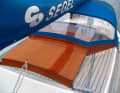 Sliding hatch and breakwater are made of mahogany wood