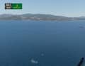 23 seconds until the start. ‘Sled’ sails right at the bottom of the screen, past the pin end. The fleet is positioned centre-right.