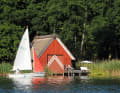 Boathouses make up the majority of the small shoreline development on the Schaalsee.