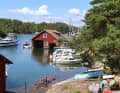 Our traders pass Restaurang Loftet on the Harstena Sound.