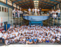 The staff of Southern Wind Shipyard. On deck are COO John Craig, CEO Marco Alberti, the Premier of the Western Cape Province, Alan Winde, and Alberto Vecchi, Italian Ambassador to South Africa