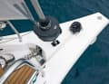 The bowsprit blends harmoniously into the hull, the vertical windlass sits outside the hull