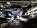 The Italian boat builders lifted the carbon fibre hull out of the negative mould and revealed the radical lines of the sailing record hunter for the first time.