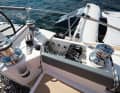Les voiles sont rassemblées : Toutes les lignes sont dirigées vers les winchs électriques de série devant les postes de pilotage. Le mécanisme de pliage est également commandé à partir de là.