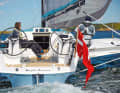 Spacious: Considering the narrow waterline of the main hull, the cockpit is spacious. A tailgate is available on request.