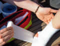 The joint is then compressed with an elastic bandage, which also supports and relieves the joint