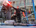 Best female skipper of the 10th Vendée Globe, best non-French participant: Justine Mettraux with beacon in her right hand.