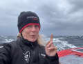 Here, the 50-year-old British woman, who lives in France, points to the sky and the harsh conditions.