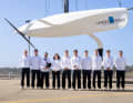 Sports Director Philippe Presti (l.) and the sailors for the La Roche-Posay Racing Team.
