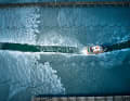 Ice covers the Maasholm marina. The sea rescue boat makes its way into the harbour. The harbour froze over again during the night
